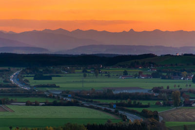 Scenic view of landscape against sky during sunset