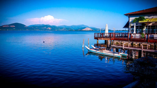 Scenic view of bay against sky