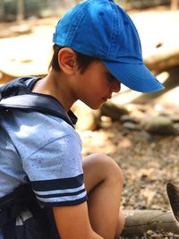 Rear view of boy looking away