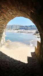 View of sea with buildings in background