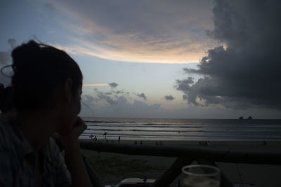 Scenic view of beach against sky during sunset