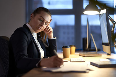 Businesswoman using mobile phone