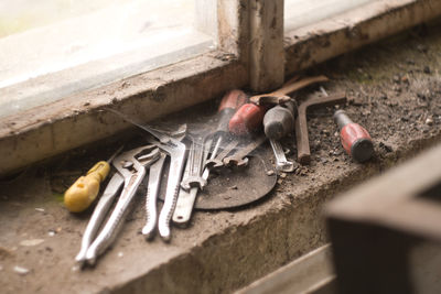 High angle view of pile of tools