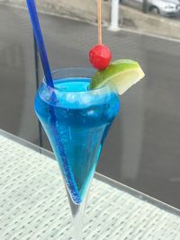 Close-up of drink on glass table