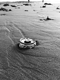 High angle view of sunglasses on beach