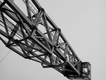 Low angle view of metallic structure against sky