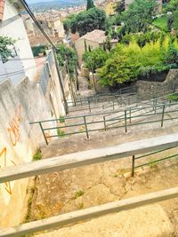 High angle view of steps by swimming pool