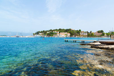 Scenic view of sea against blue sky