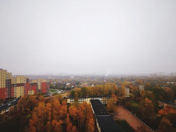 High angle view of buildings against clear sky