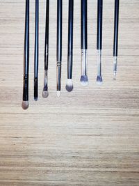 High angle view of objects on hardwood floor