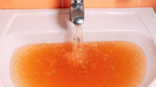 Close-up of drink in sink