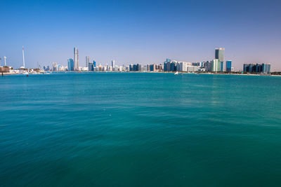 View of cityscape against clear sky