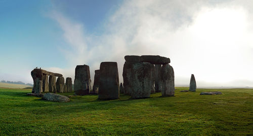 Scenic view of stonehenge against sky