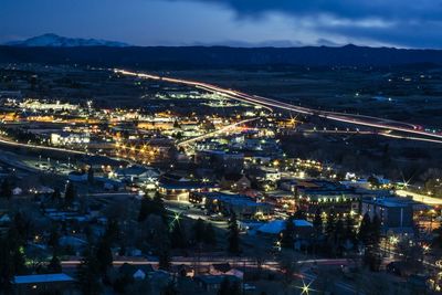 Aerial view of illuminated cityscape at night