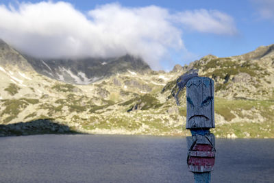 Scenic view of sea against mountains