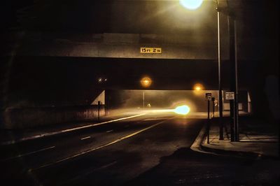 Illuminated road at night