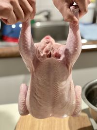 Close-up of man preparing food at home