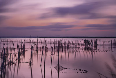 Scenic view of sea against sky at sunset