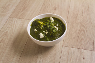 High angle view of salad in bowl on table