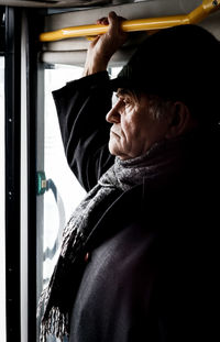 Portrait of man in train