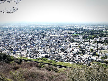 High angle shot of townscape against clear sky