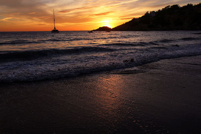 Scenic view of sea against sky during sunset