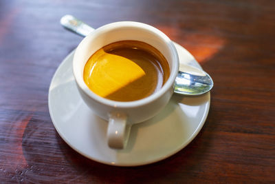 High angle view of tea cup on table