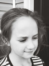 Close-up of thoughtful girl at home