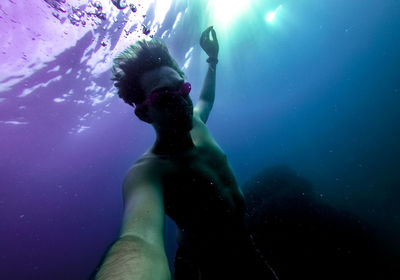 Man swimming in sea