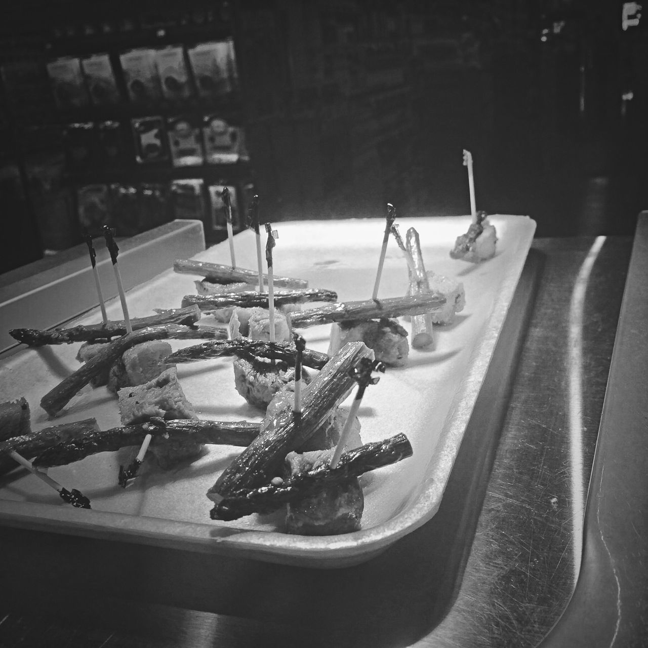 food, indoors, food and drink, high angle view, fish, seafood, still life, table, transportation, no people, plate, mode of transport, healthy eating, fork, dead animal, freshness, day, large group of objects, abundance, close-up