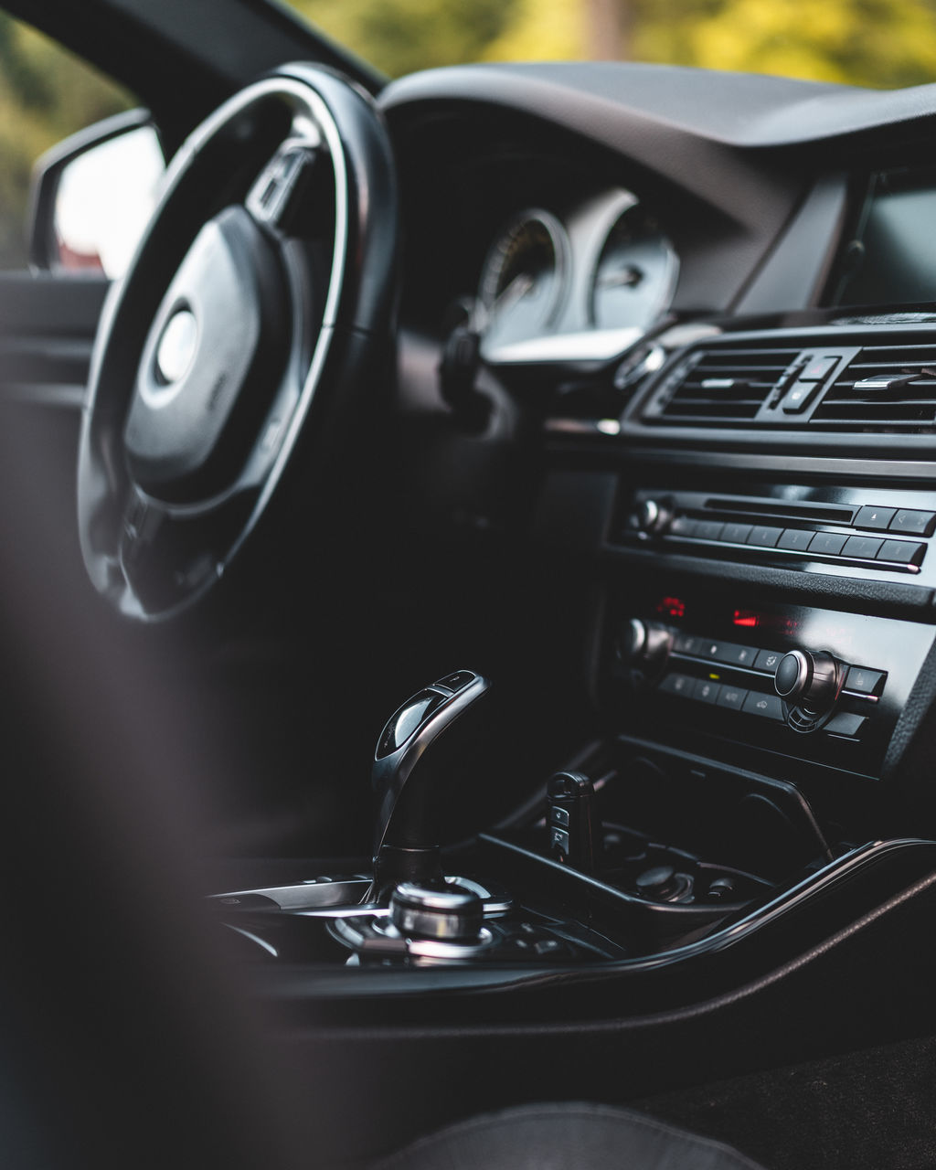 CLOSE-UP OF VINTAGE CAR ON FLOOR