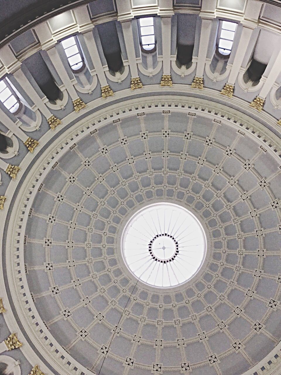 architecture, built structure, ceiling, indoors, circle, low angle view, directly below, pattern, architectural feature, design, dome, skylight, arch, geometric shape, building exterior, spiral staircase, ornate, history, famous place, clock