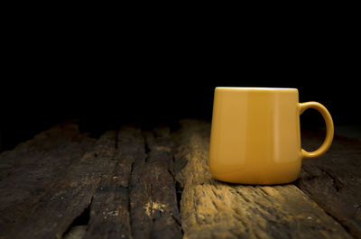 Close-up of coffee cup on table