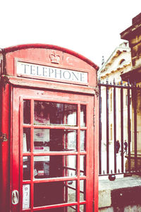 Close-up of red telephone booth