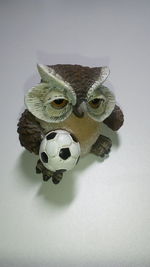 Close-up of soccer ball against white background