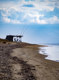 Scenic view of beach against sky