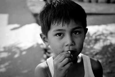 Close-up portrait of poor boy