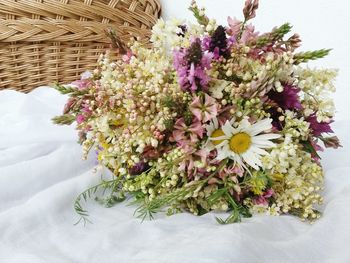 Close-up of flowers in basket