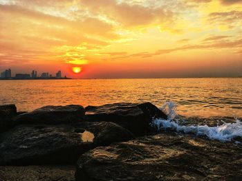 Scenic view of sea against sky during sunset