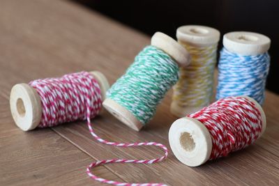 Close-up of thread on table