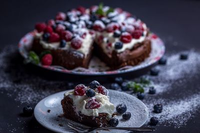 Close-up of cake in plates on table