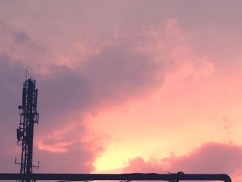 Low angle view of cloudy sky at sunset