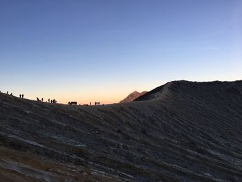 View of desert against clear sky