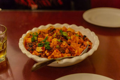 Close-up of food served in plate on table