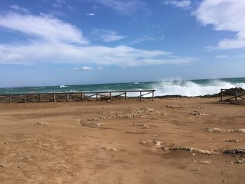 Scenic view of beach against sky