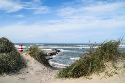 Scenic view of beach against sky