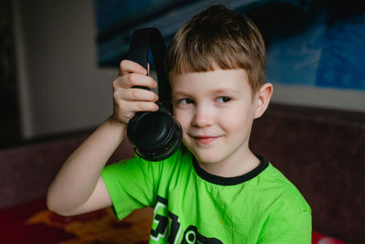 Portrait of young woman using mobile phone