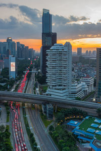 High angle view of city at sunset