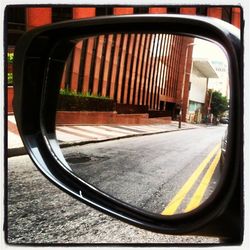 Close-up of side-view mirror