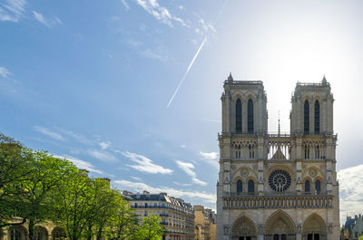 Notre-dame de paris bathed in the spring sunshine 